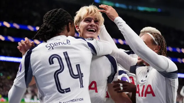 Tottenham players celebrate a goal
