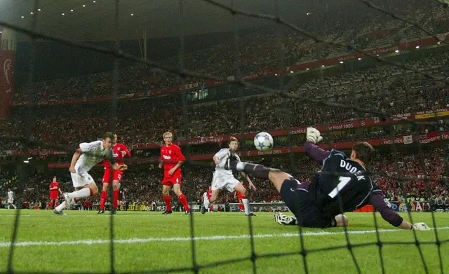 Liverpool goalkeeper Jerzy Dudek of Poland saves a shot from AC Milan forward Andriy Shevchenko