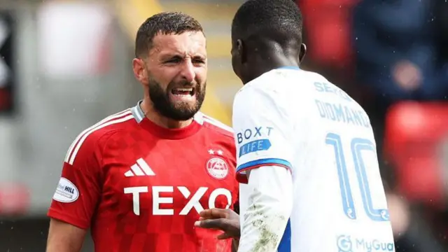Graeme Shinnie and Mohamed Diomande