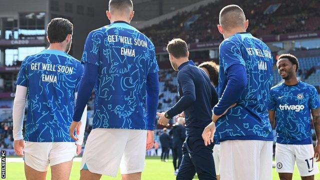 Players wear get well soon t-shirts