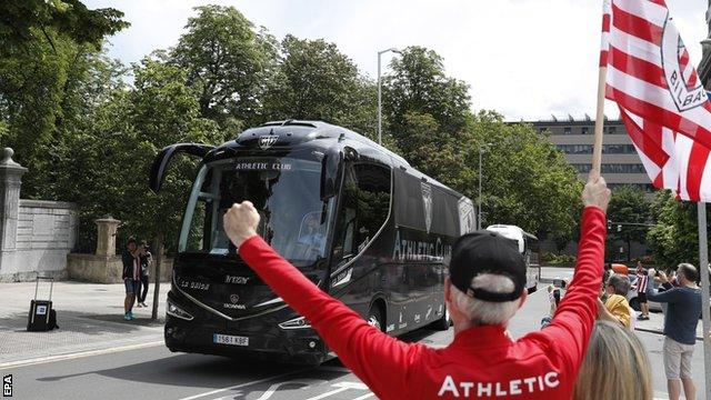 Athletic Bilbao fans greeted the team coach before the match at the San Mames Stadium