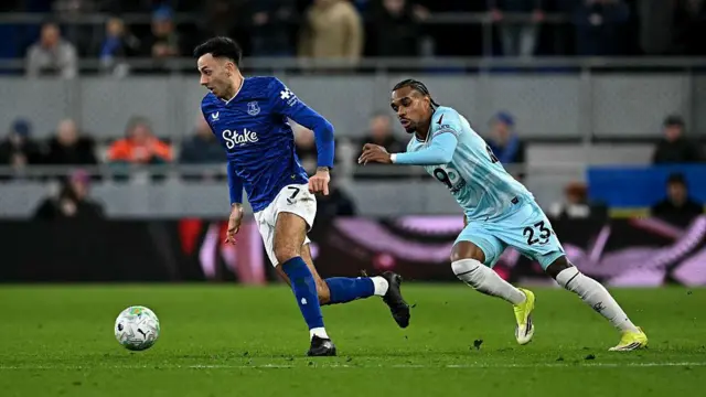 Dwight McNeil runs with the ball