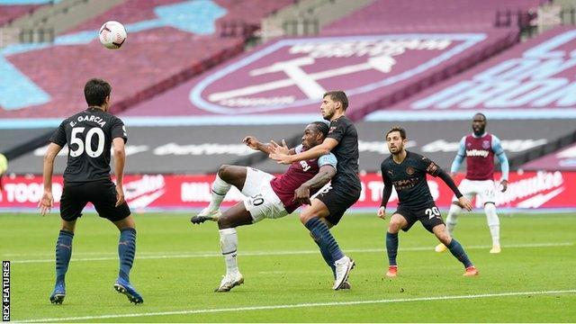 Michail Antonio scores for West Ham against Manchester City in the Premier League