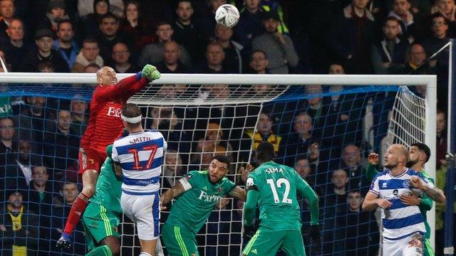 Watford goalkeeper Heurelho Gomes in action against Queens Park Rangers in the FA Cup