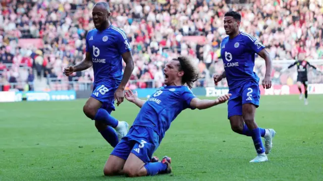 Jordan Ayew celebrates with James Justin and Wout Faes