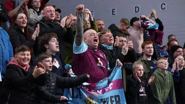 Burnley fans celebrating at Turf Moor