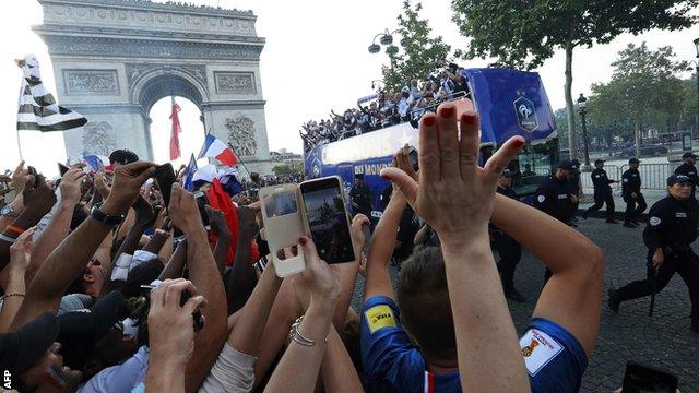 France players on an open-top bus parade