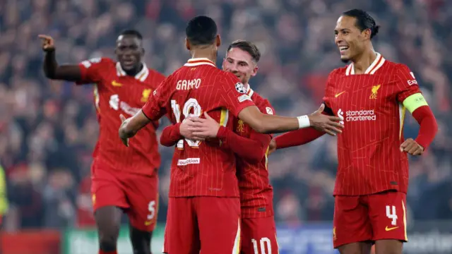 Alexis Mac Allister, Virgil van Dijk and Cody Gakpo of Liverpool celebrate 2nd goal during the UEFA Champions League 2024/25 League Phase MD4 match between Liverpool FC and Bayer 04 Leverkusen at Anfield on November 5, 2024 