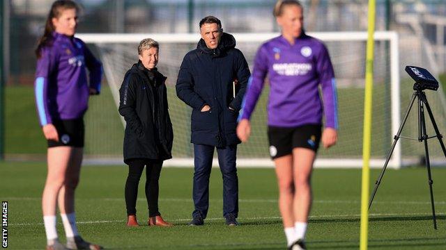 Phil Neville and Bev Priestman at Manchester City's training ground