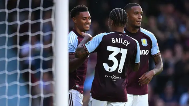 Ollie Watkins, Leon Bailey and Ezri Konsa celebrate a goal for Aston Villa