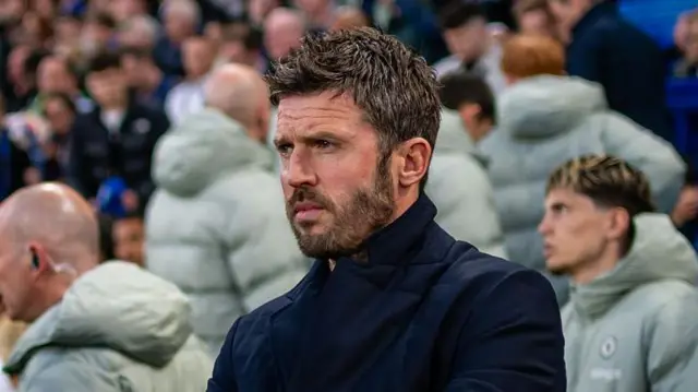Michael Carrick watching Manchester United in action from the touchline