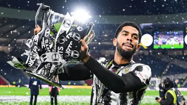 Miguel Freckleton lifts the Scottish League Cup with St Mirren