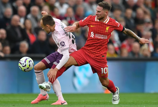  Brentford's Mikkel Damsgaard battles with Liverpool's Alexis Mac Allister