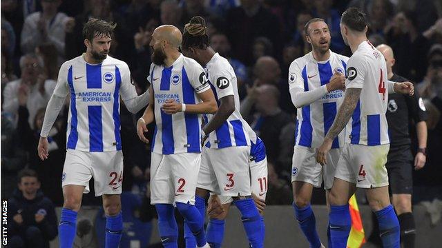 Brighton players celebrate