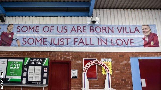 A banner at Villa Park featuring Smith and his assistant John Terry