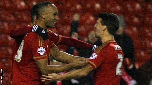 Chris Grady (left) celebrates scoring for Nottingham Forest against Fulham