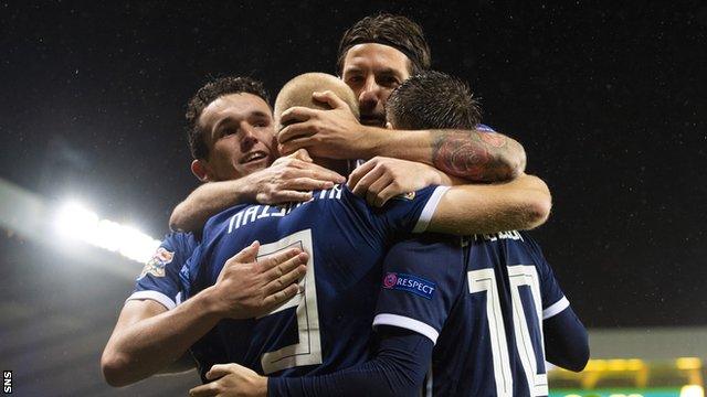 Steven Naismith is congratulated after scoring Scotland's second