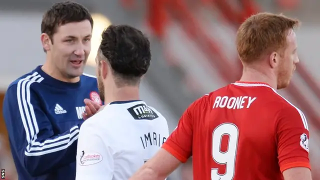 Accies boss Martin Canning congratulates scorer Dougie Imrie at the final whistle