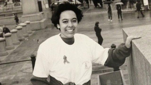 Black and white photo of Michelle Clayford in Trafalgar Square, London