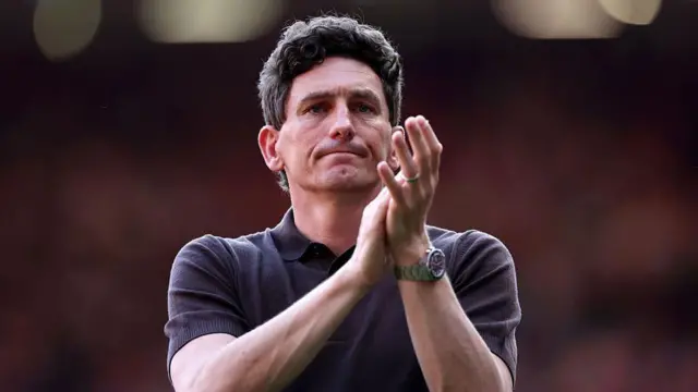 Keith Andrews applauds