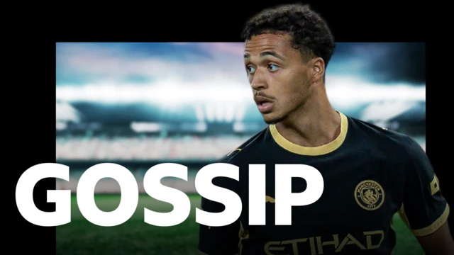 Max Alleyne, wearing Manchester City's black away shirt with yellow trim and details. He appears on BBC Sport's gossip column graphic which has 'gossip' written in white letters on top of a blurred out floodlit football stadium