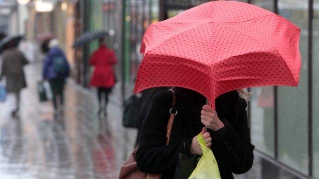 woman with large umbrella