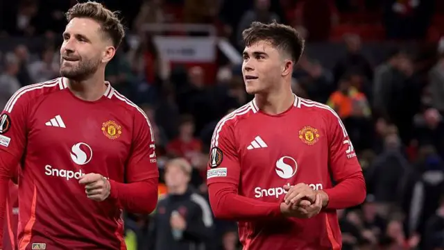 Manchester United defenders Luke Shaw and Harry Amass