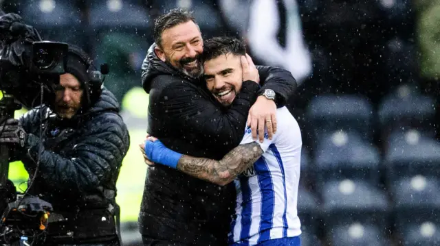 Derek McInnes hugs Danny Armstrong