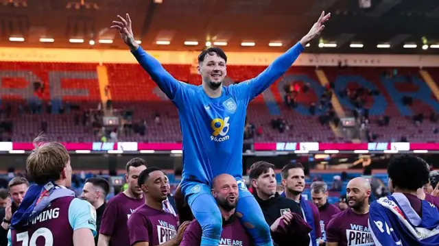 James Trafford of Burnley celebrates promotion with the home supporters during the Sky Bet Championship match between Burnley FC and Sheffield United FC at Turf Moor