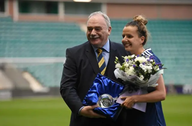 Hayley Lauder receiving award for 100th cap