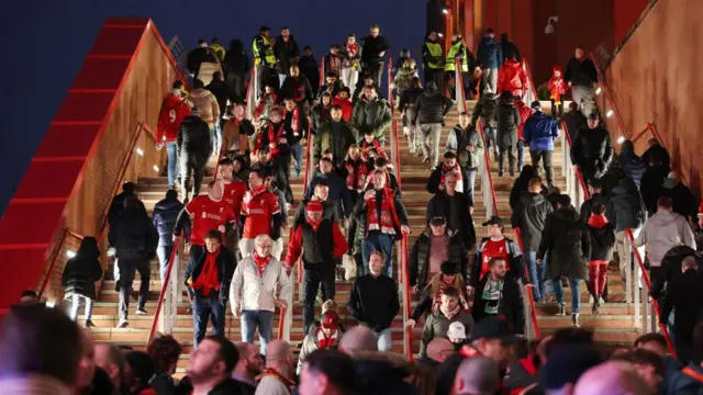 Fans arrive outside Anfield