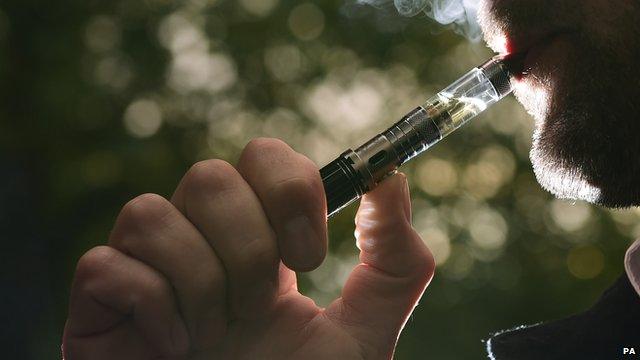 Close up of man smoking an electronic cigarette