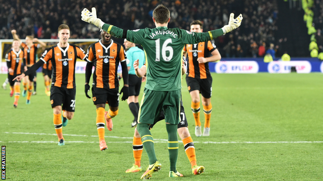 Hull's players rush to congratulate keeper Eldin Jakupovic after their victory over Newcastle