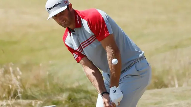 Dustin Johnson hits a shot