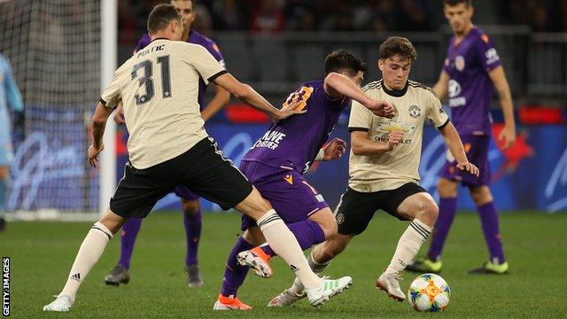 Daniel James (right) and Manchester United team-mate Nemanja Matic (left)