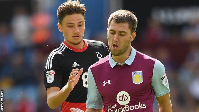 Matty Cash of Nottingham Forest and Aston Villa's Gary Gardner