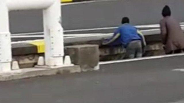 Migrants on train track at Calais