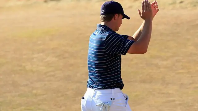 Jordan Spieth claps