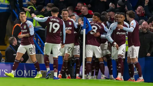 Ollie Watkins of Aston Villa celebrates scoring his team's second goal against Chelsea with team-mates