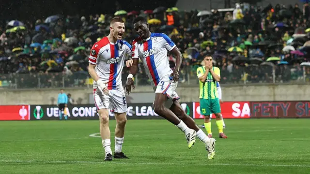 Ismaila Sarr of Crystal Palace celebrates with Adam Wharton 