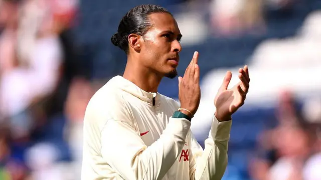 Virgil van Dijk of Liverpool applauds the fans after the pre-season friendly match between Preston North End and Liverpool at Deepdale