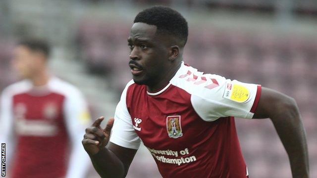 Christopher Missilou in action for Northampton Town