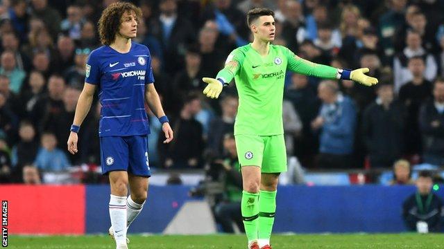 Chelsea goalkeeper Kepa Arrizabalaga (right) refuses to be substituted during the Carabao Cup final