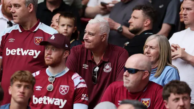 Fans of West Ham United look dejected.