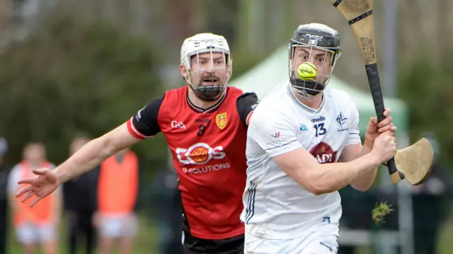 David Qualter is challenged by Donal Hughes