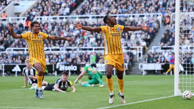 Danny Welbeck of Brighton & Hove Albion celebrates scoring his team's first goal during the Premier League match between Newcastle United FC and Brighton & Hove Albion FC at St James' Park