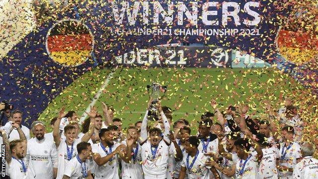 Germany's players celebrate winning the 2021 European Under-21 Championship final against Portugal