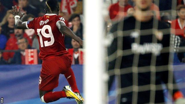 Sadio Mane celebrates scoring for Liverpool against Sevilla in the Champions League