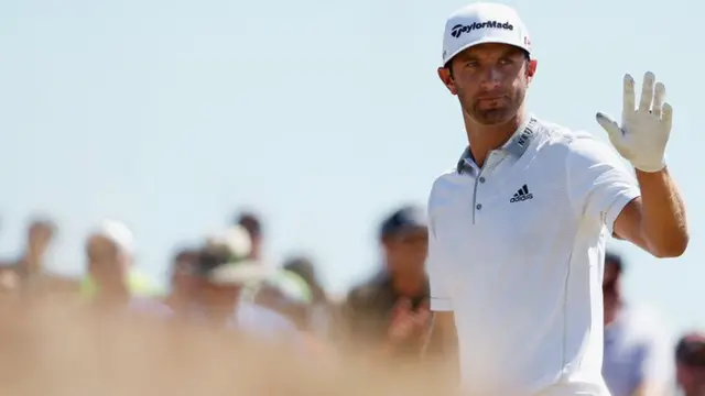 Dustin Johnson waves