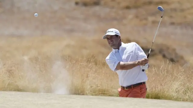 Ben Martin hits a bunker shot